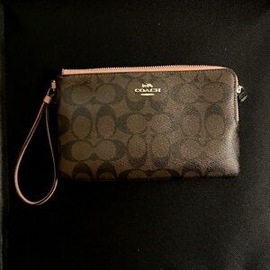 Coach Wrislet like new! Excellent condition, brown with pink detailing
